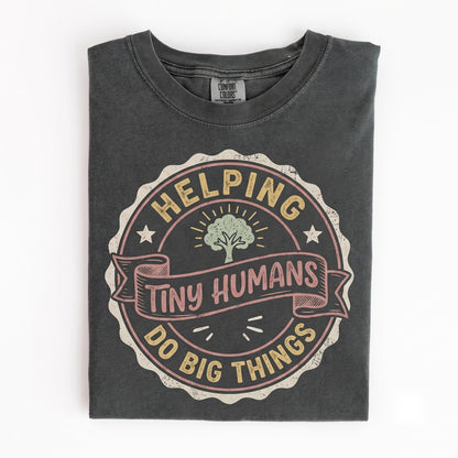 Cute Helping Tiny Humans Teacher Gift Inspirational Colorful Kindergarten Classroom School Graphic Apparel Unisex TShirt