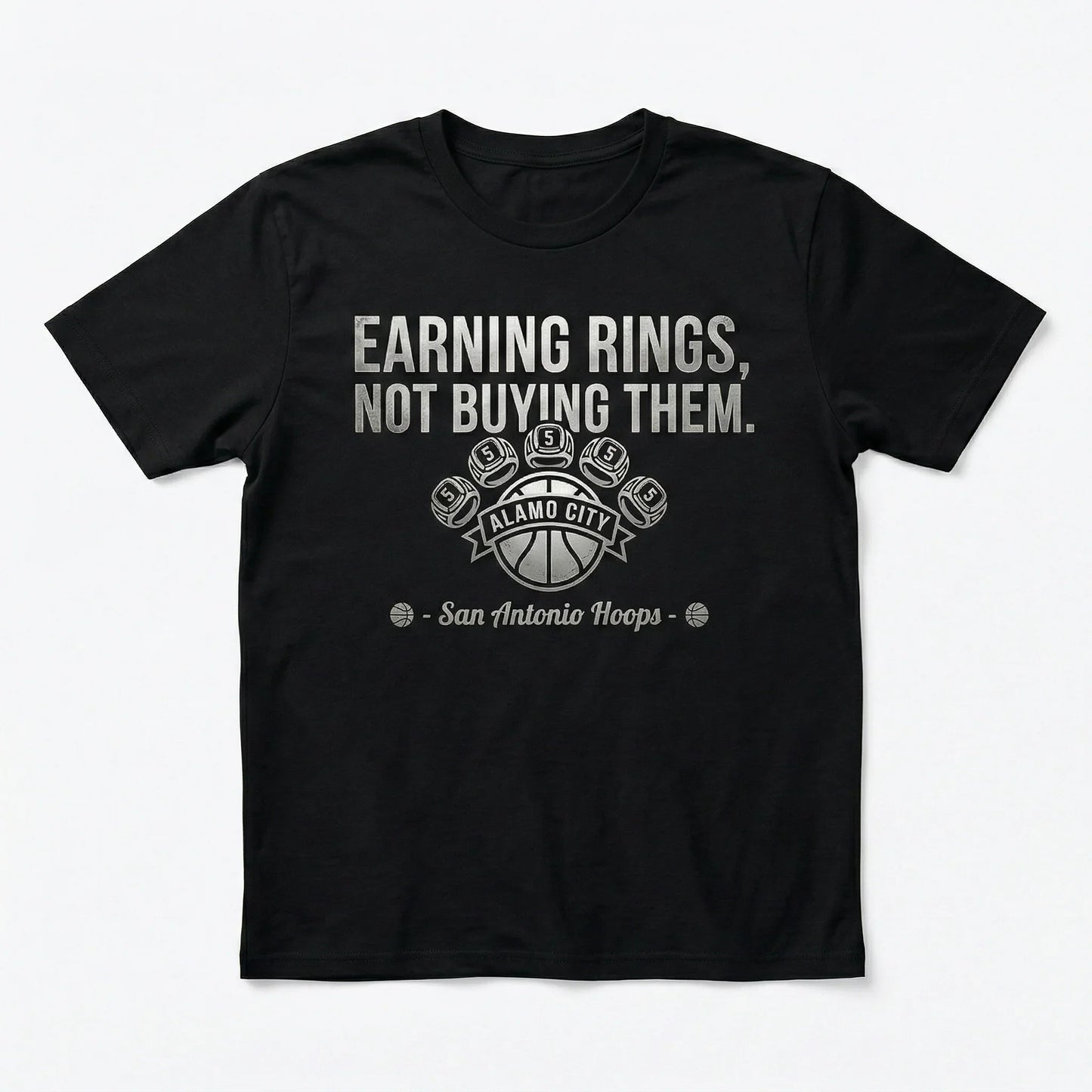 Black t-shirt with 'Earning rings, not buying them' San Antonio Hoops basketball graphic.