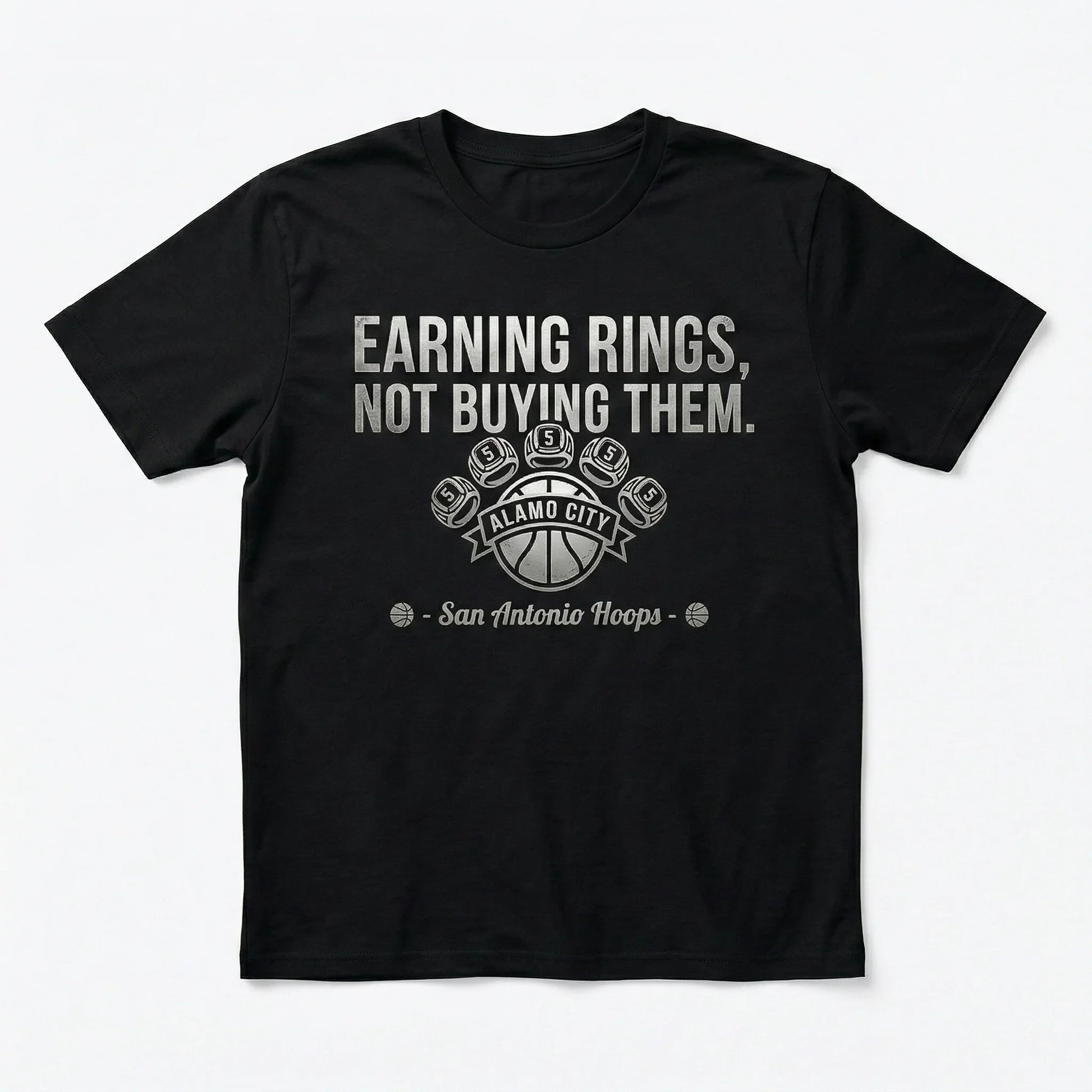 Black t-shirt with 'Earning rings, not buying them' San Antonio Hoops basketball graphic.