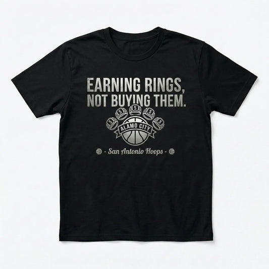 Black t-shirt with 'Earning rings, not buying them' San Antonio Hoops basketball graphic.