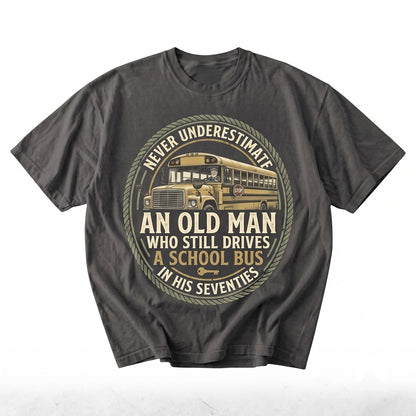Never Underestimate An Old Man Who Still Drives A School Bus Funny Driver Gift Unisex TShirt