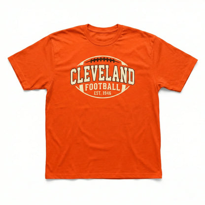 Orange t-shirt with Cleveland Football graphic and sports theme on white background