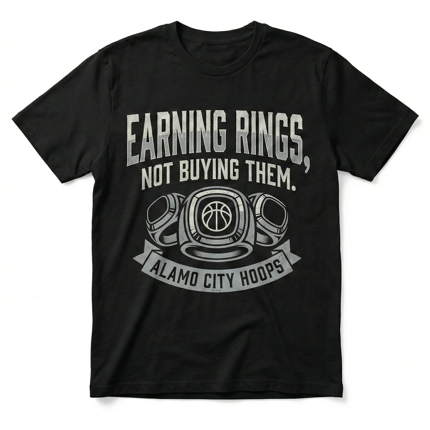Black t-shirt with 'Earning Rings, Not Buying Them. Alamo City Hoops' and basketball rings graphic