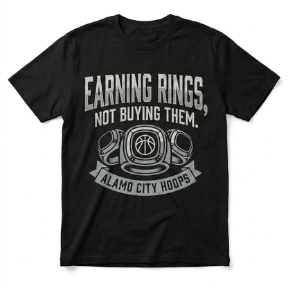 Black t-shirt with 'Earning Rings, Not Buying Them. Alamo City Hoops' and basketball rings graphic