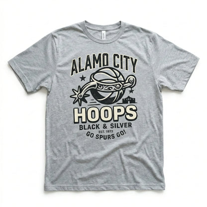 Gray t-shirt with Alamo City Hoops basketball graphic, text in black and cream lettering.