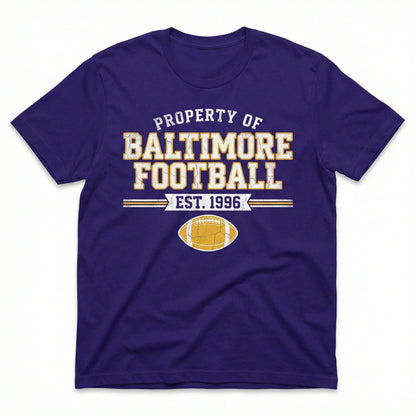 Purple Baltimore football t-shirt with yellow text and football graphic, EST. 1996