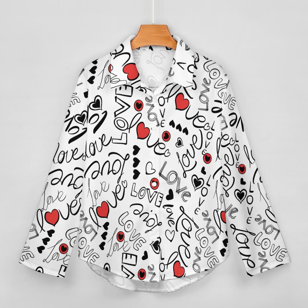 White button-up shirt with black love-themed text and red heart patterns, hanging on hanger