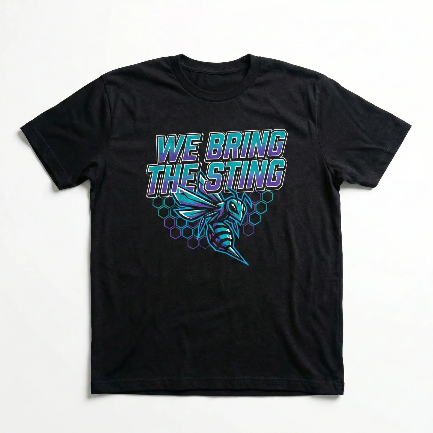 Black graphic t-shirt with 'We Bring The Sting' and a hornet design, hexagon pattern