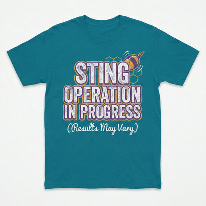 Teal graphic T-shirt with "Sting Operation In Progress (Results May Vary)" and bee illustration