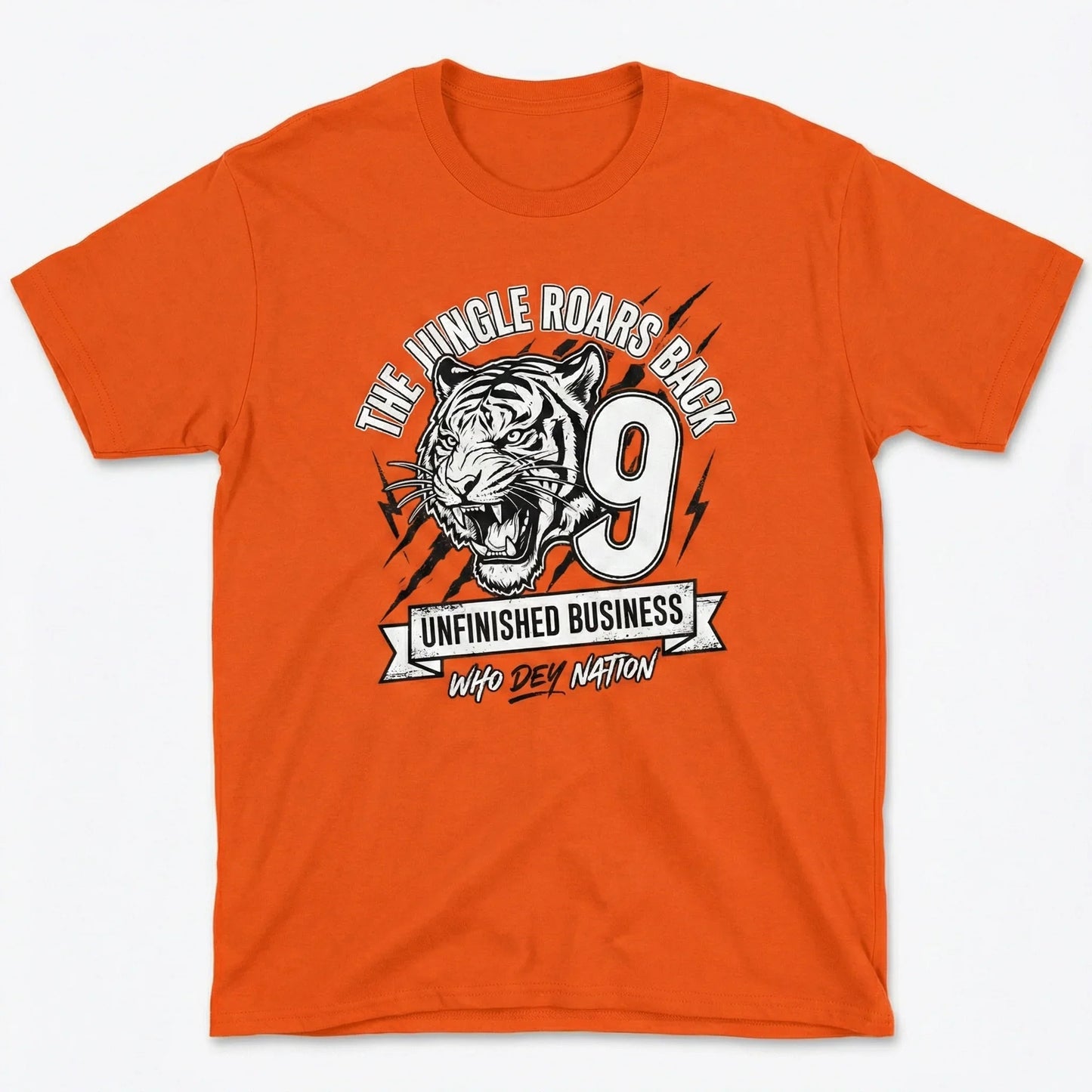 Orange t-shirt with roaring tiger graphic, number 9, and text The Jungle Roars Back, Unfinished Business, Who Dey Nation.