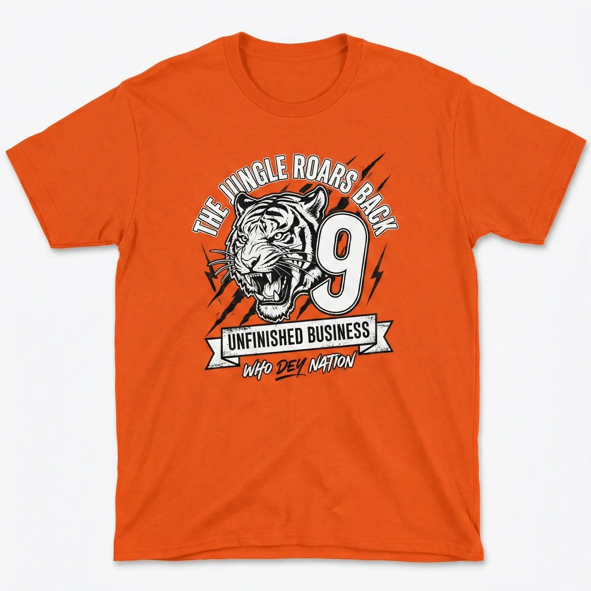 Orange t-shirt with roaring tiger graphic, number 9, and text The Jungle Roars Back, Unfinished Business, Who Dey Nation.
