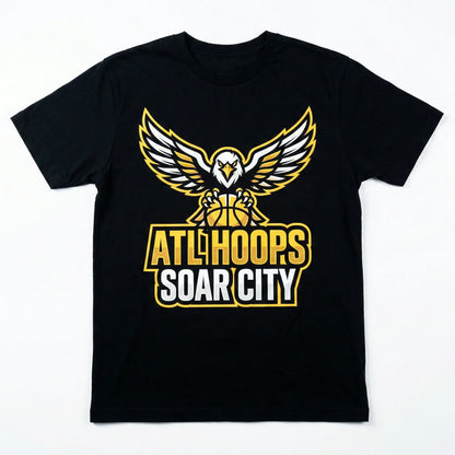 Black t-shirt with basketball owl graphic and ATL Hoops Soar City text in yellow and white.