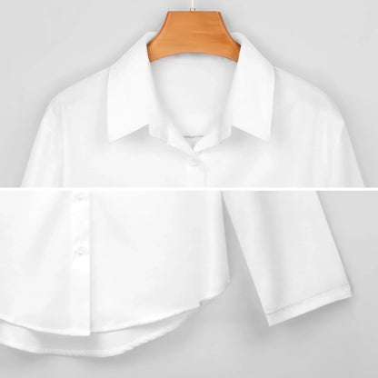 White button-down shirt with classic collar and short sleeves on wooden hanger