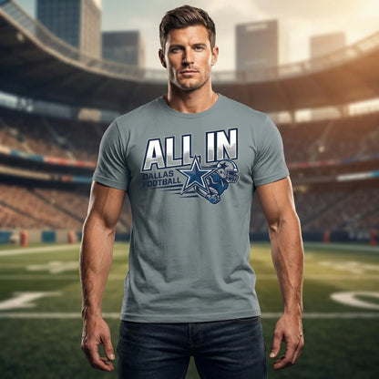 Man wearing grey 'All In Dallas Football' t-shirt, standing in a football stadium.