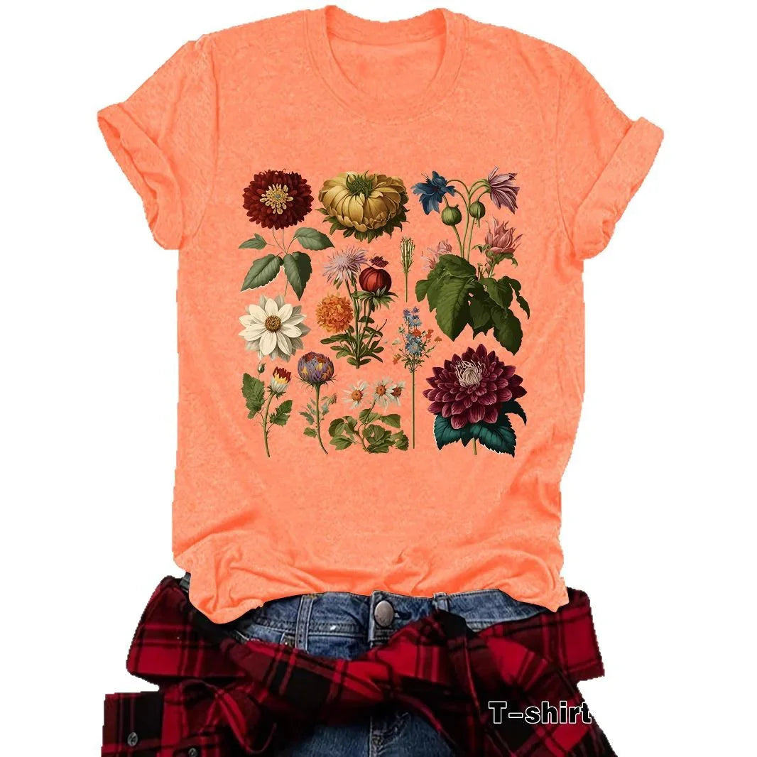 Coral t-shirt with vintage botanical floral print, styled with jeans and flannel