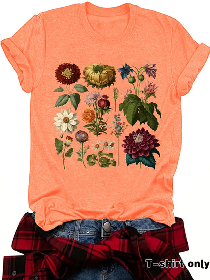 Orange graphic tee with vintage floral print, displayed with jeans and plaid shirt