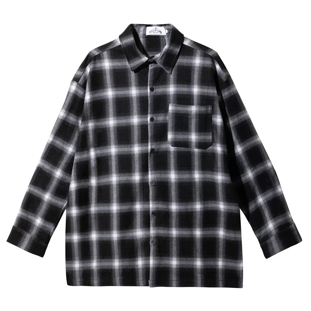 Black and white plaid long-sleeve flannel shirt with chest pocket, button-up front