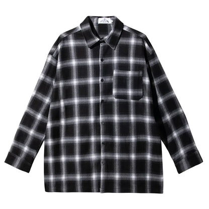 Black and white plaid long-sleeve flannel shirt with chest pocket, button-up front