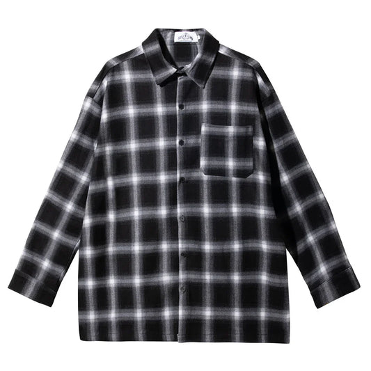 Black and white plaid long-sleeve flannel shirt with chest pocket, button-up front