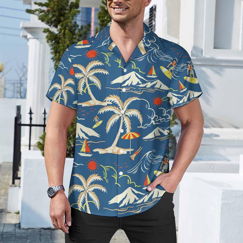 Man wearing a short sleeve tropical print shirt with palm trees, surfers, and sailboats outdoors