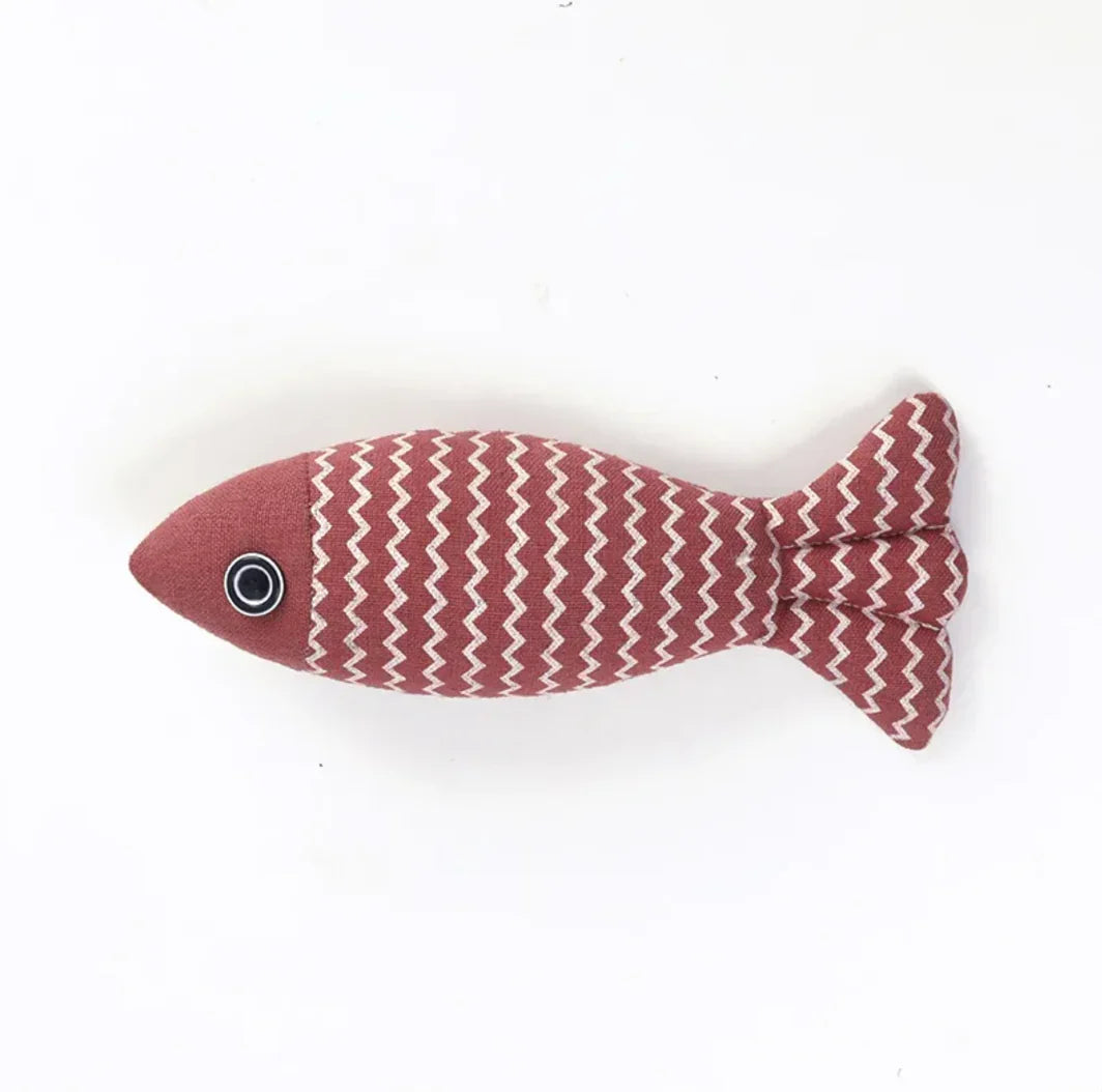 Plush fish-shaped pet toy with zigzag pattern on white background from BabyFour